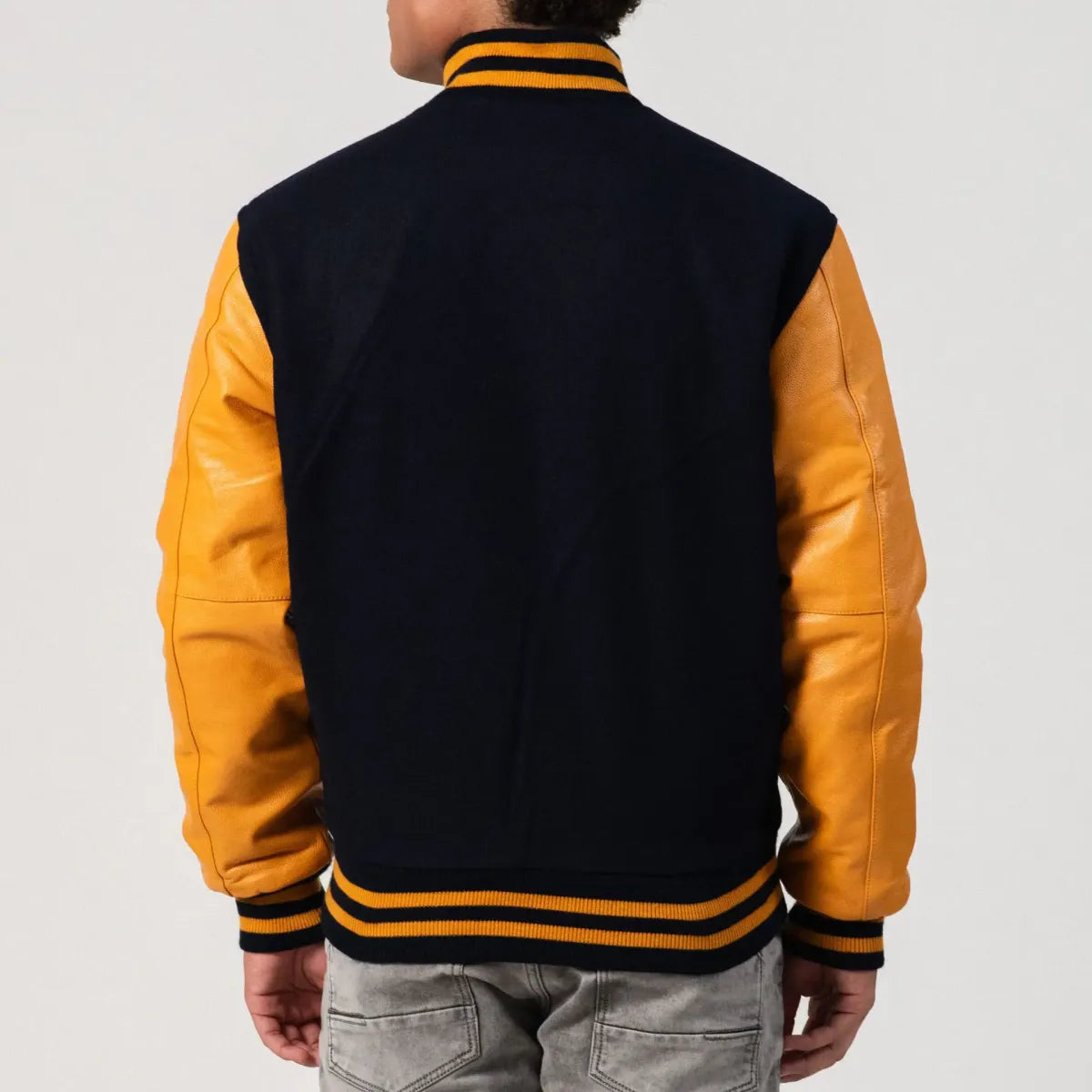 "Sebastian Black Wool Body & Old Gold Leather Sleeves Varsity Jacket – Customizable for Schools, Clubs & Brands"