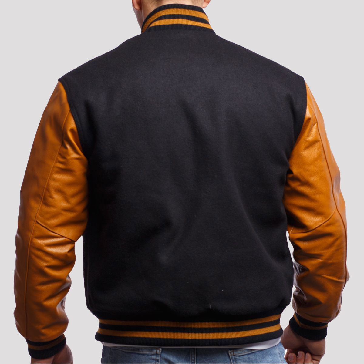 "Sebastian Black Wool Body & Old Gold Leather Sleeves Varsity Jacket – Customizable for Schools, Clubs & Brands"